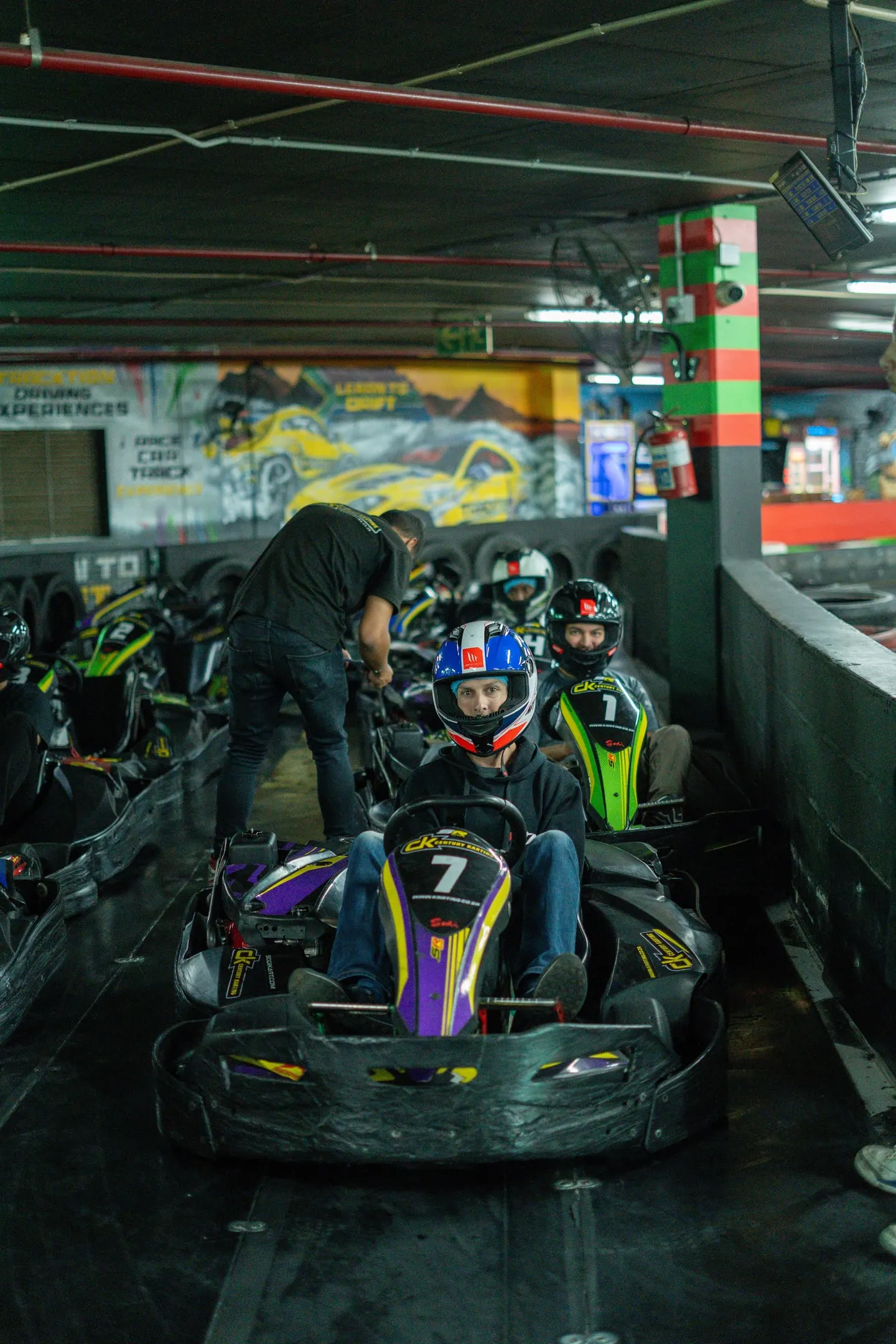 Karts lined up in the pits before a heat